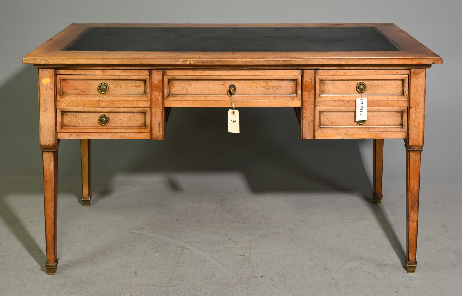 French Black Leather Top Desk: French Black Leather Top Desk - 31 in tall x 55.5 x 27.5, The kneehole is 23.25 inches from the floor to under x 18.5 inches wide