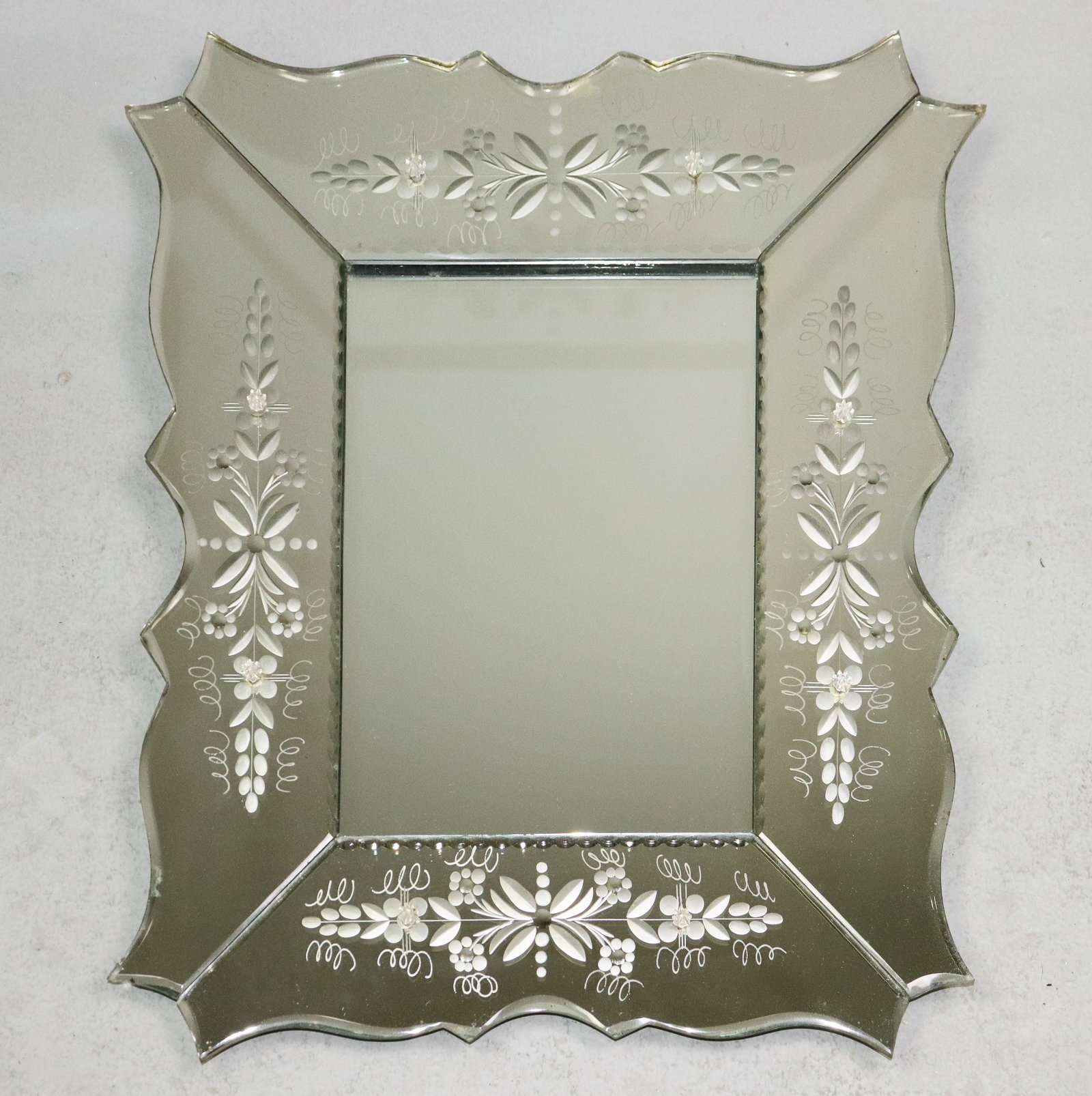 Venetian Etched Style Mirror: Venetian Etched Glass Mirror that measures that measures 24 in tall x 20.5 in x 1 in.