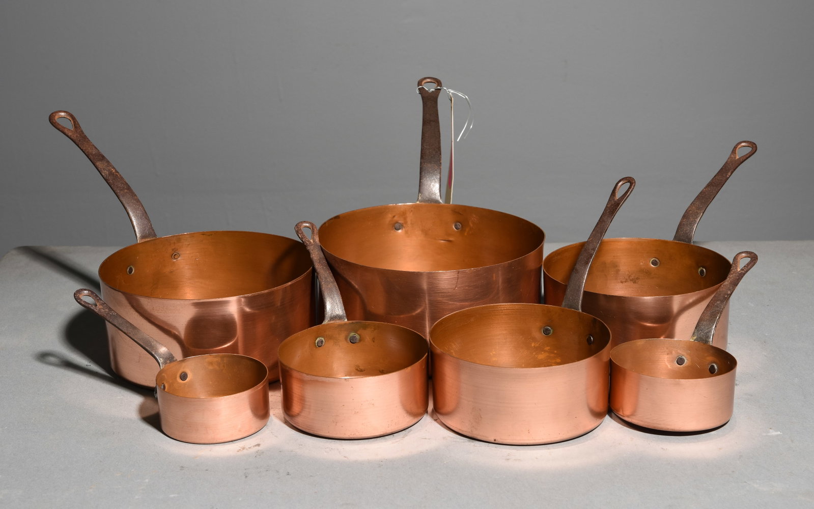 French Copper Set of 7 Graduated Sauce Pans: French Copper Set of 7 Graduated Sauce Pans - Largest is 7 in tall x 8 x 15
