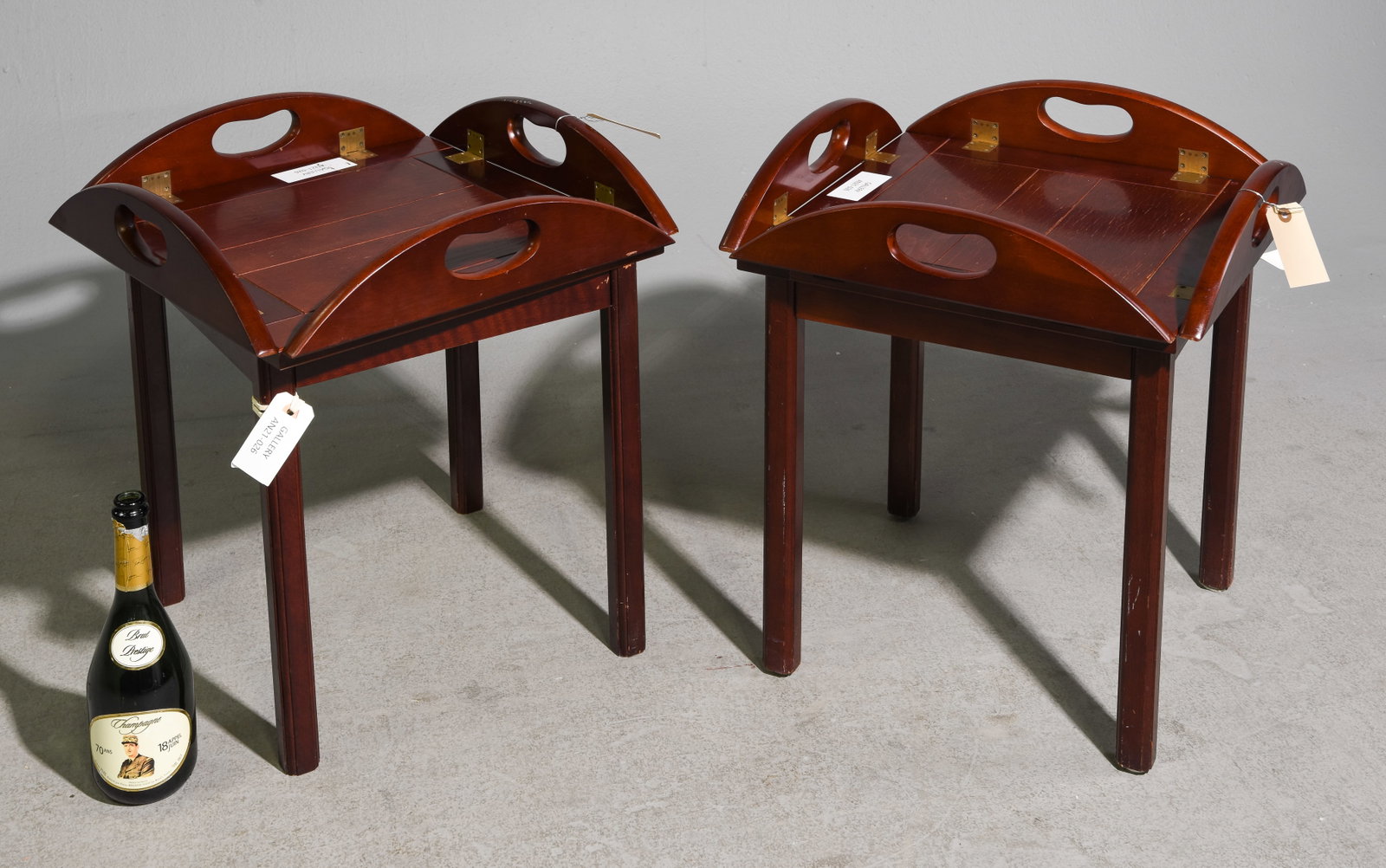 2 Danish Mahogany Butler Side Tables: 2 Danish Mahogany Butler Side Tables - 22.5 in tall x 18.5 x 18.5 with the sides up, 19 in tall x 24 x 24 with the sides down