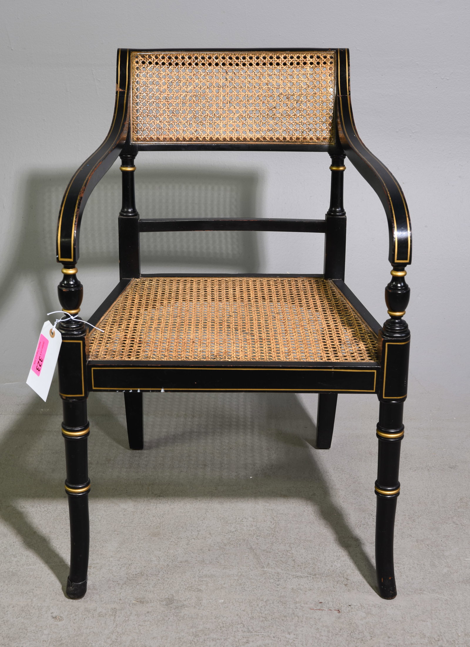 Black Lacquered Caned Arm Chair: Black Lacquered Caned Arm Chair - 33 in tall x 21.5 x 19.5 with a seat height of 17 inches