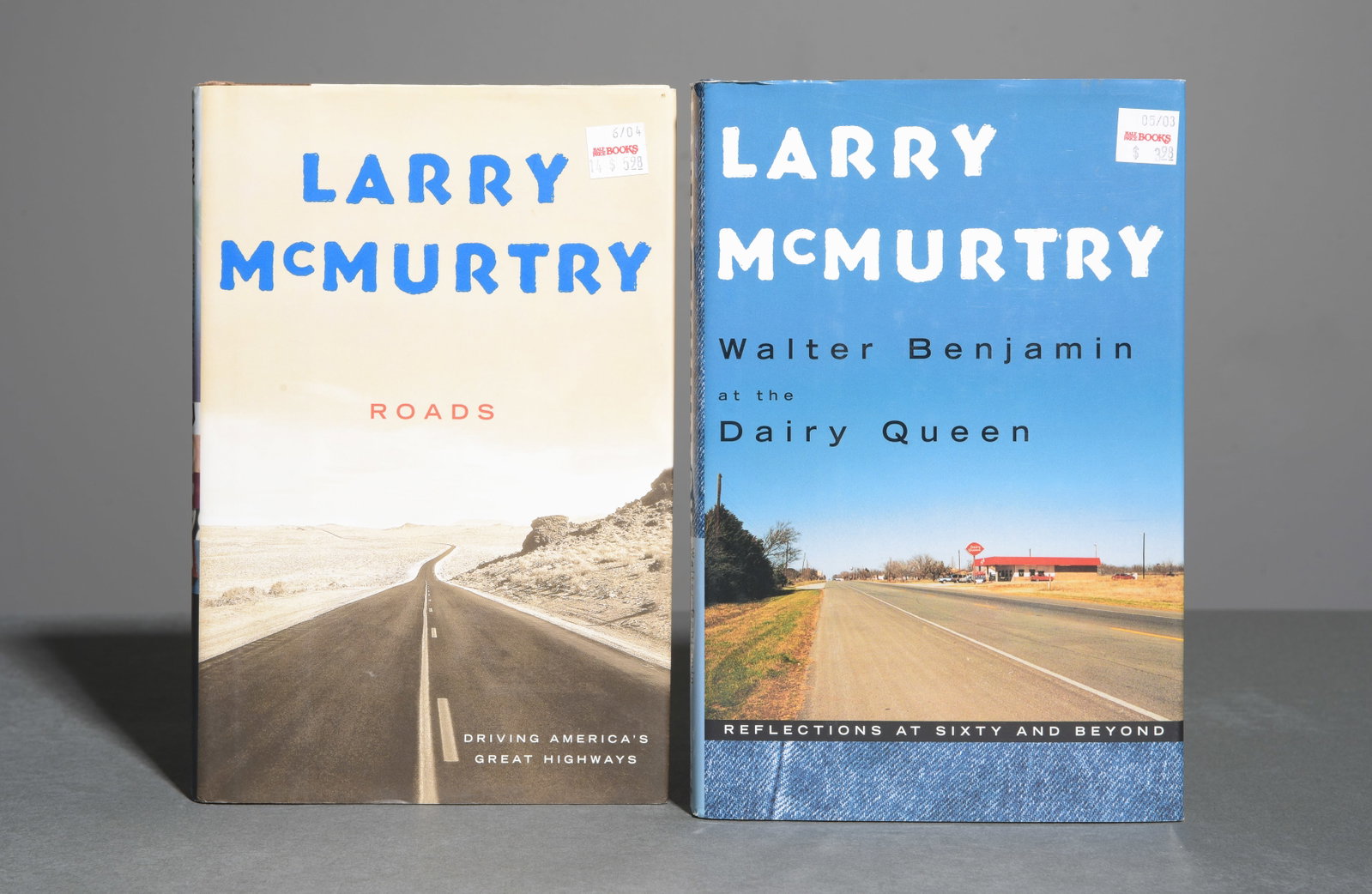McMurtry HC Set : Roads & Walter Benjamin DQ: This lot features two of Larry McMurtry's most personal and reflective works non-fiction, exploring the American landscape and his own intellectual journey. Included in this lot : Walter Benjamin at t