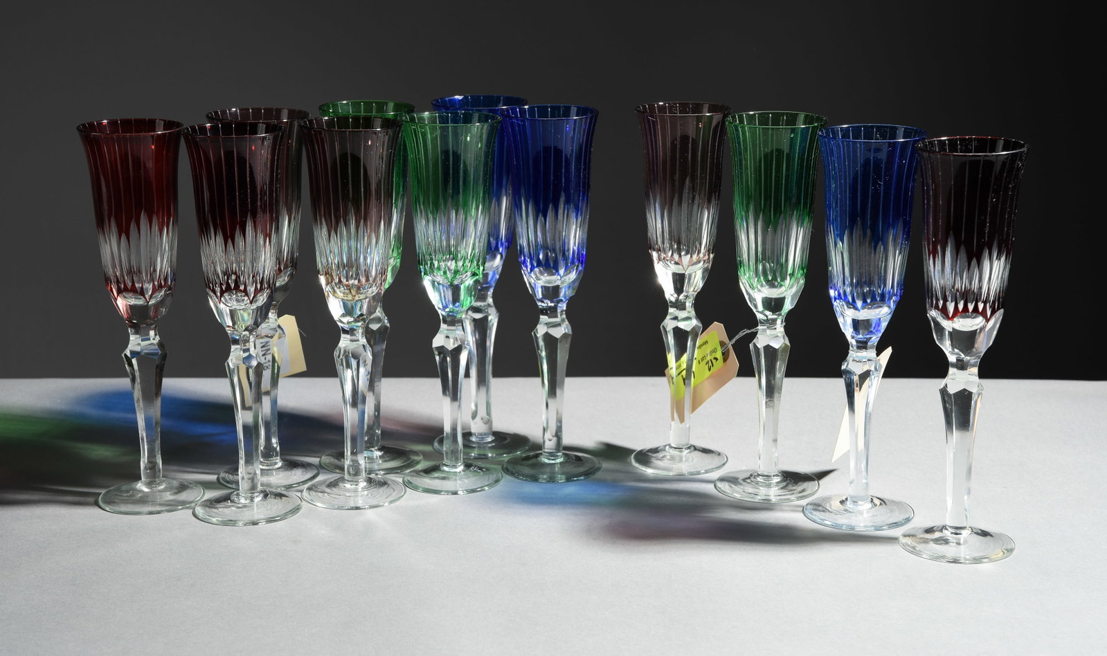 12 Multi Color Cut to Clear Champagne Flutes: 12 Multi Color Cut to Clear Champagne Flutes / Stems - 9.5 in tall x 2.5 inch diameter each