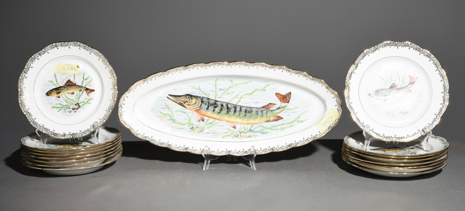 17pc French Fish Plate Set - Platter & 16 Plates: 17pc French Fish Plate Set - Platter & 16 Plates - Platter is 1.75 in tall x 21.25 x 9, The plates are 1 in tall x 9.75 inch diameter each