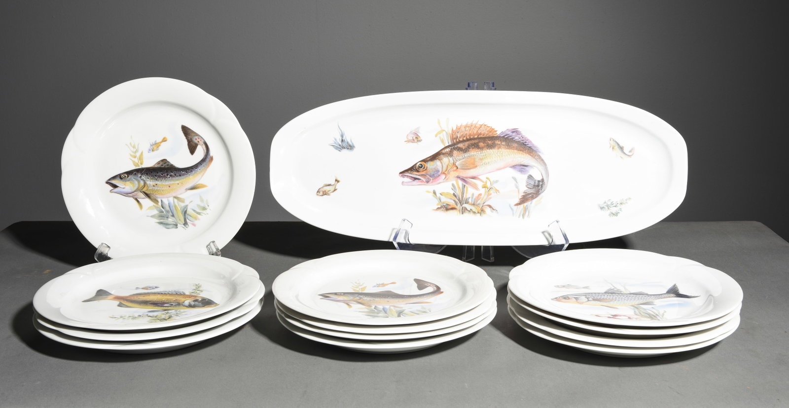 13pc French Fish Plate Set - Platter & 12 Plates: 13pc French Fish Plate Set - Platter & 12 Plates - Platter is 1.25 in tall x 21.75 x 8.25, Plates are 1 in tall x 10 inch diameter each