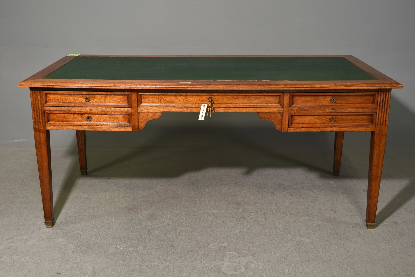 Louis XVI Style Green Leather Top Desk: French Louis XVI Style Green Leather Top Desk - 30.5 in tall x 70.5 x 35.5, Kneehole is 24.5 inches from the floor to under by 24.5 inches wide, Total space between the legs is 63 inches