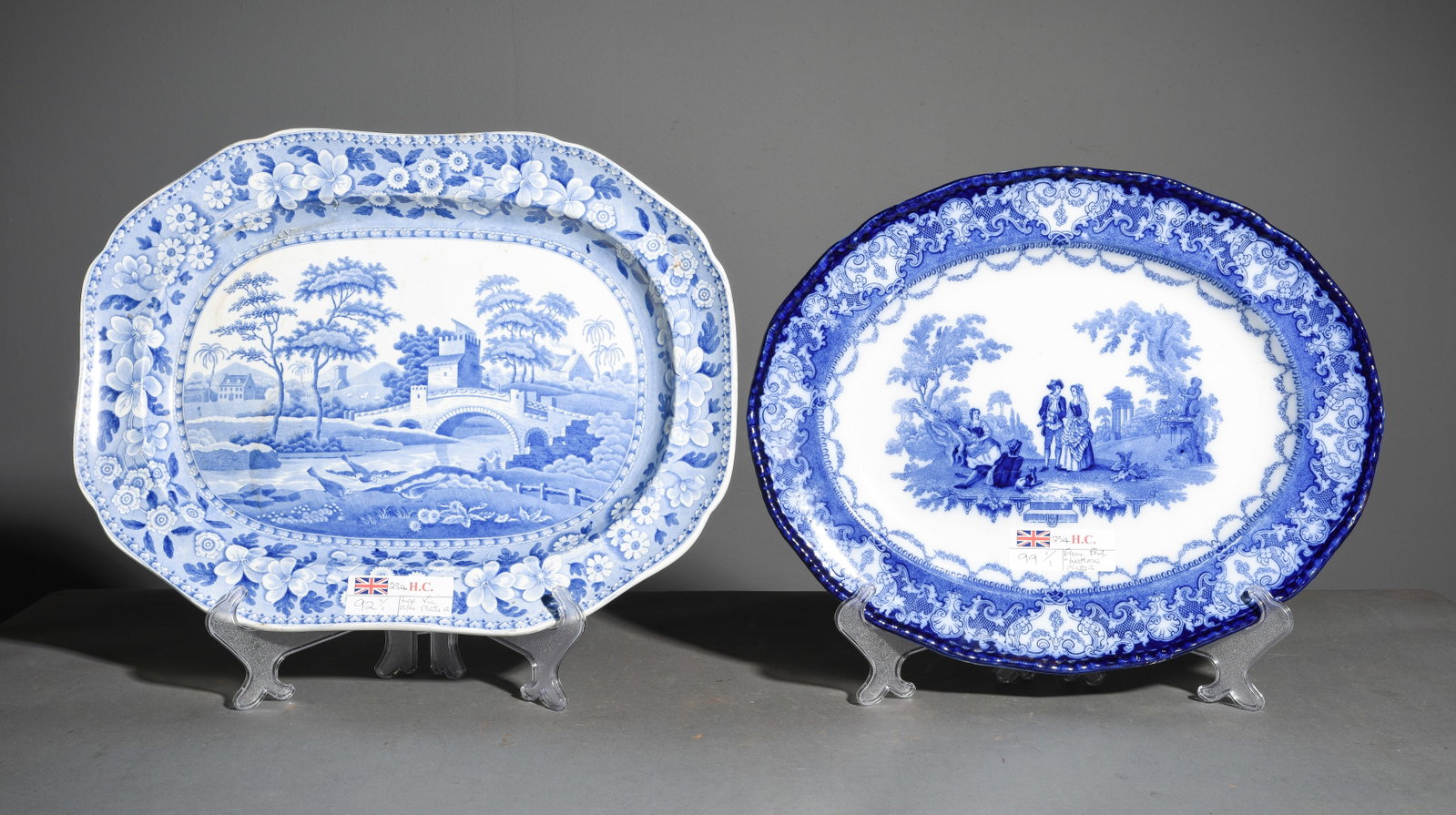 2 Blue & White / Flo Blue Platters: 2 Blue & White / Flo Blue Platters - The flo blue is marked Royal Doulton "Watteau" - 1.5 in tall x 17.5 x 14