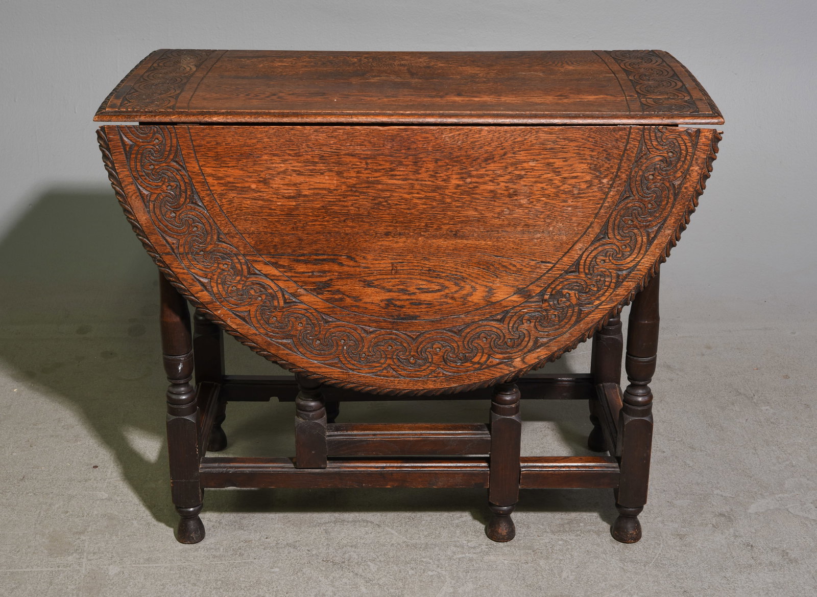 British Carved Oak Drop Leaf Table: British Carved Oak Drop Leaf Table - 29 in tall x 36 x 17, leaves are 16 in each