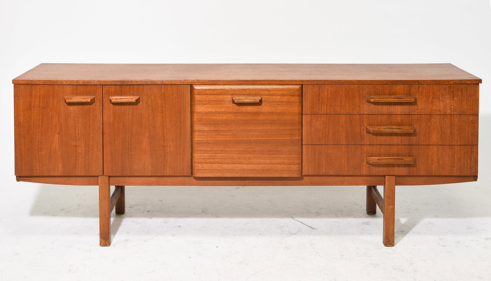 Mid Century Modern Sideboard / Credenza: Danish Modern Style Sideboard / Credenza with Drop Front Door and Three Drawers - 29 in tall x 77.5 x 19