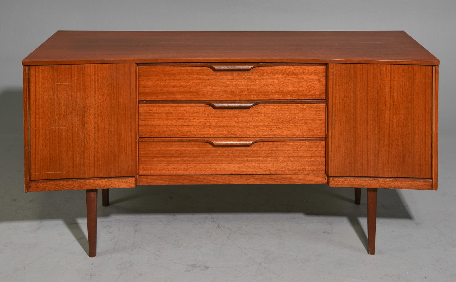 Mid Century Modern Concave Credenza - Austinsuite: Danish Modern Style Concaved Front Credenza with three central drawers by Austinsuite - 27 in tall x 51.5 x 18