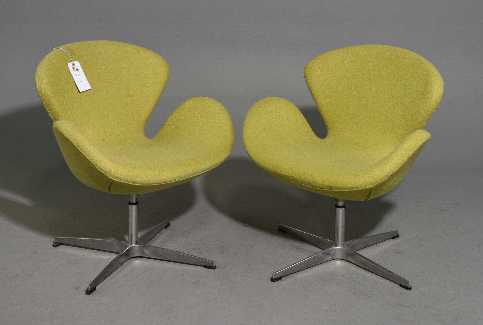 Zuo Pori Pair of Modern Swivel Arm Chairs: Zuo Pori Pair of Modern Swivel Arm Chairs - 31 in tall x 22 x 22 each with a seat height of 17 inches