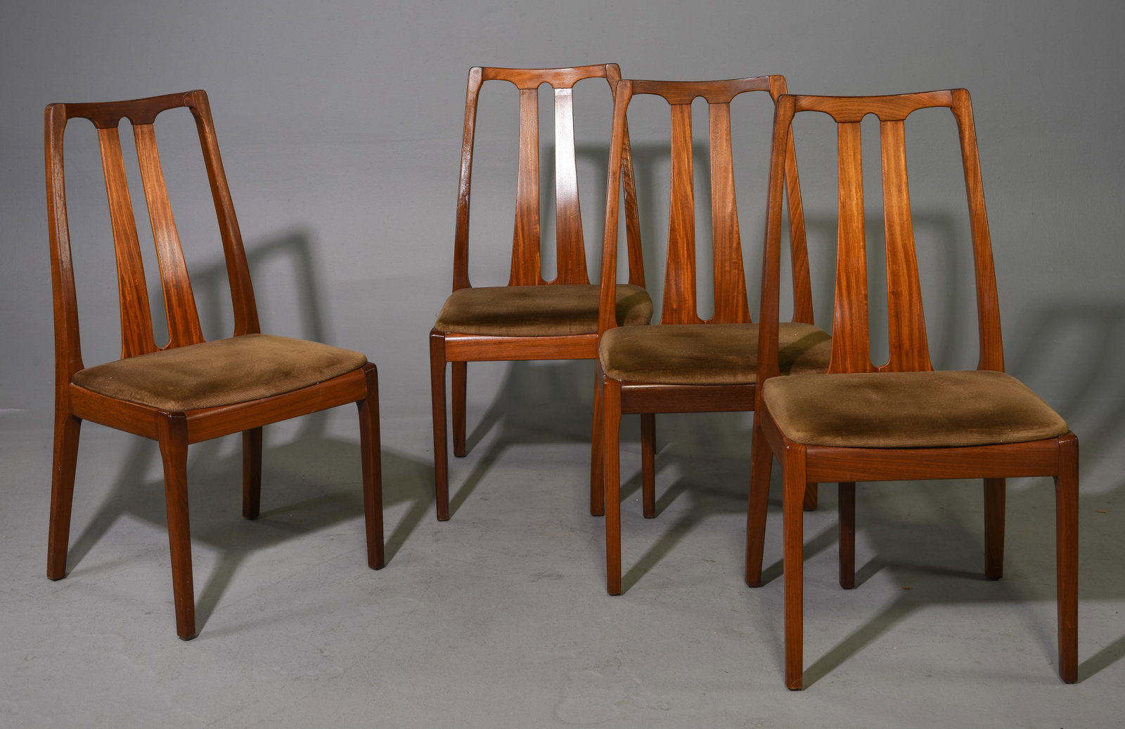 4 Mid Century High Back Dining Chairs By Nathan: This set of Danish Modern Style Teak Dining chairs is made by Mid Century Modern Furniture Maker Nathan. - 38 in tall x 19 x 20 each with a seat height of 18 inches