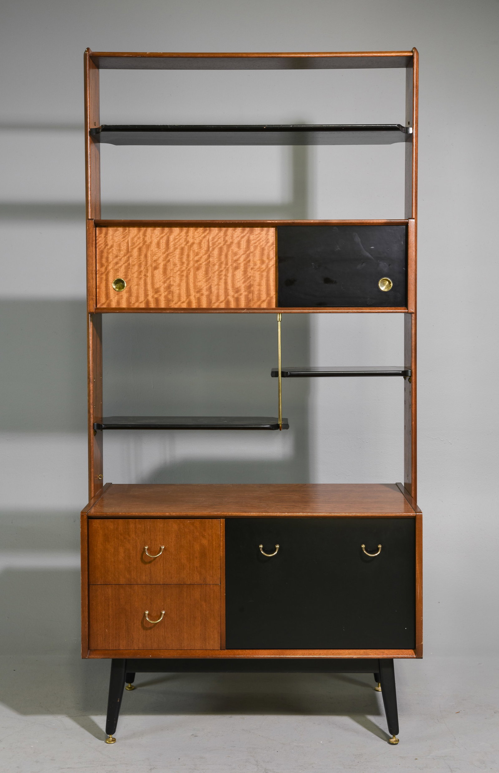 Mid Century Room Divider / Bookcase - Gplan: Danish Modern Style Bookcase / Wall Unit. This is the Librenza Model By Gplan, in their Black & Tola Finish. It is fully Finished on the back this piece can "Float" in a room. - 75.5 in tall x 37.5 x
