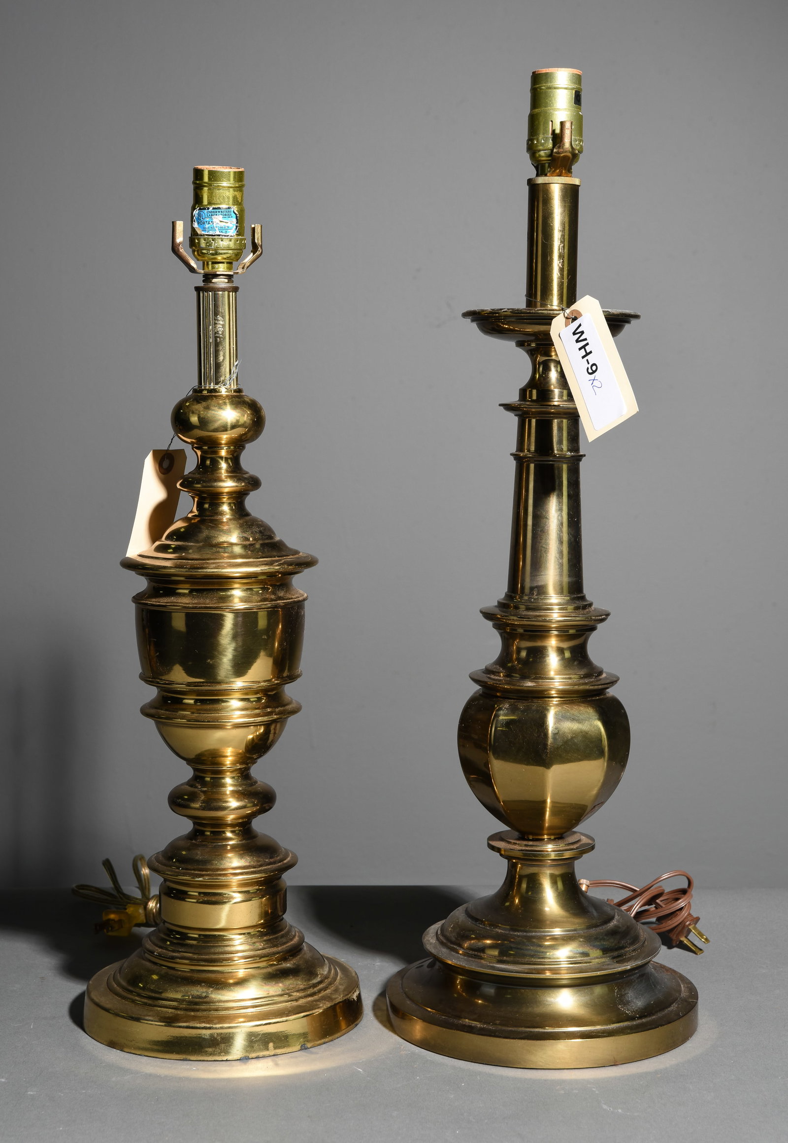 2 Brass Finished Table Lamps: 2 Brass Finished Table Lamps - Largest is 23.5 in tall x 7.5 inch diameter