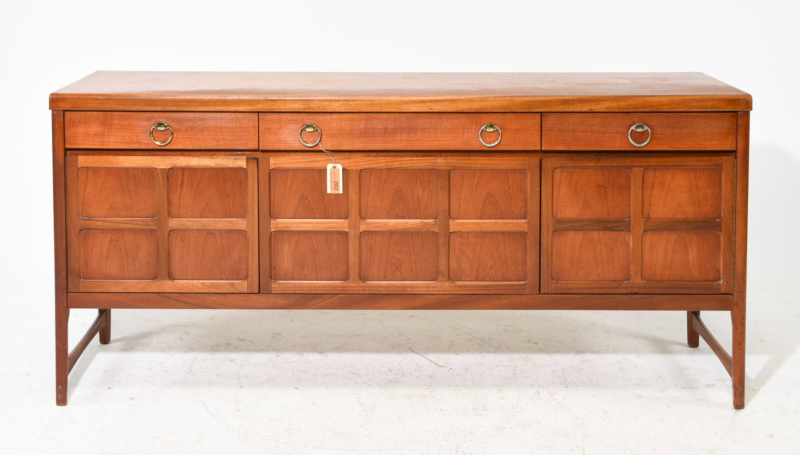 Mid Century Modern Teak Sideboard by Nathan: Danish Modern Style Teak Sideboard with Brass Ring Pulls by Nathan - 33 in tall x 72 x 18