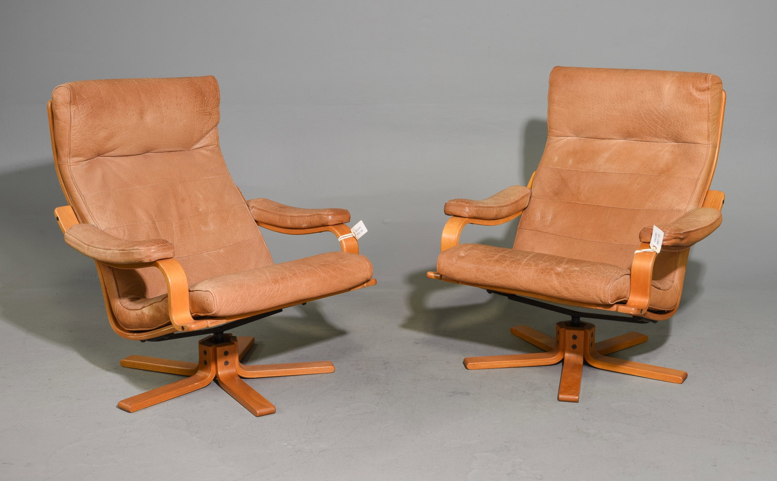 Danish Pair of Tan / Camel Leather Arm Chairs #1: Danish Pair of Tan / Camel Leather Arm Chairs - 36.5 in tall x 30.5 x 34 each with a seat height of 15.5 inches