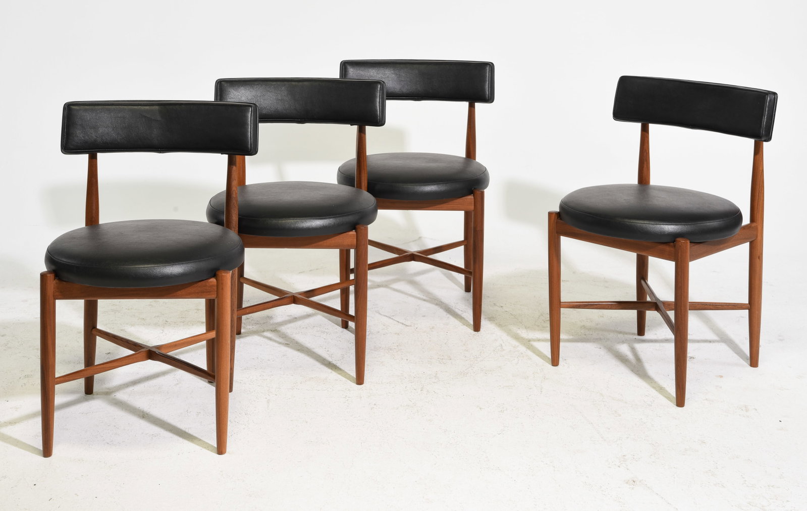 4 Mid Century Round Dining Chairs By G-Plan: This set of 4 Danish Modern Style Teak Dining chairs is made by British Furniture Maker G-Plan (Gplan). - 30 in tall x 19 x 19.5 each with a Seat height is 15 inches