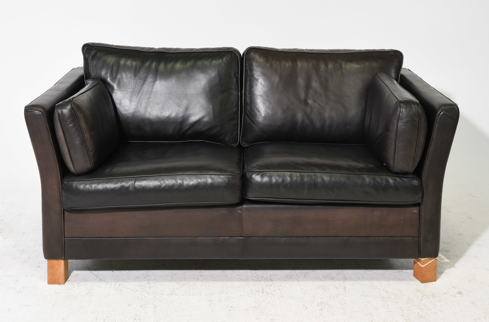 Danish Modern Black Leather Two Seater Sofa: Danish Modern Black Leather Two Seater Sofa - 31 in tall x 63 x 34 with a seat height of 18 inches