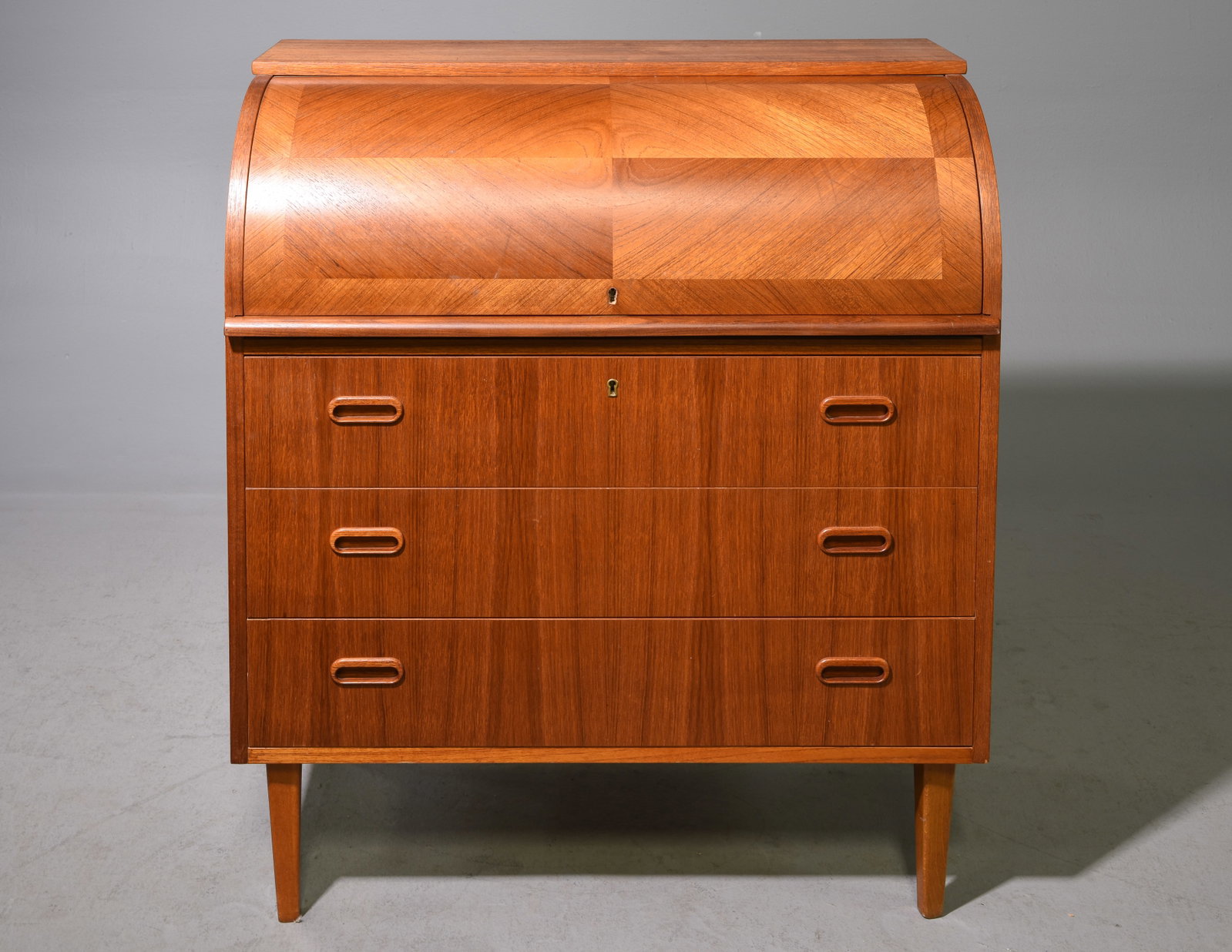 Mid Century Modern Cylinder Roll Top Desk: Danish Modern Style Cylinder Roll Top Desk with Pull Out Surface and Three Drawers - 38 in tall x 33.5 x 18