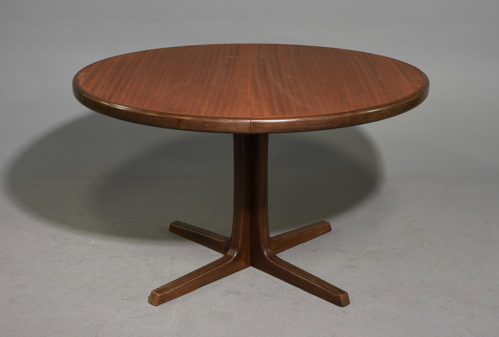 Mid Century Modern Round Table with 2 Leaves: Danish Modern Style Round Table with 2 Insertable Leaves attributed to Skovby - 28.5 in tall x 41 inch diameter, Leaves add an additional 20 inches each