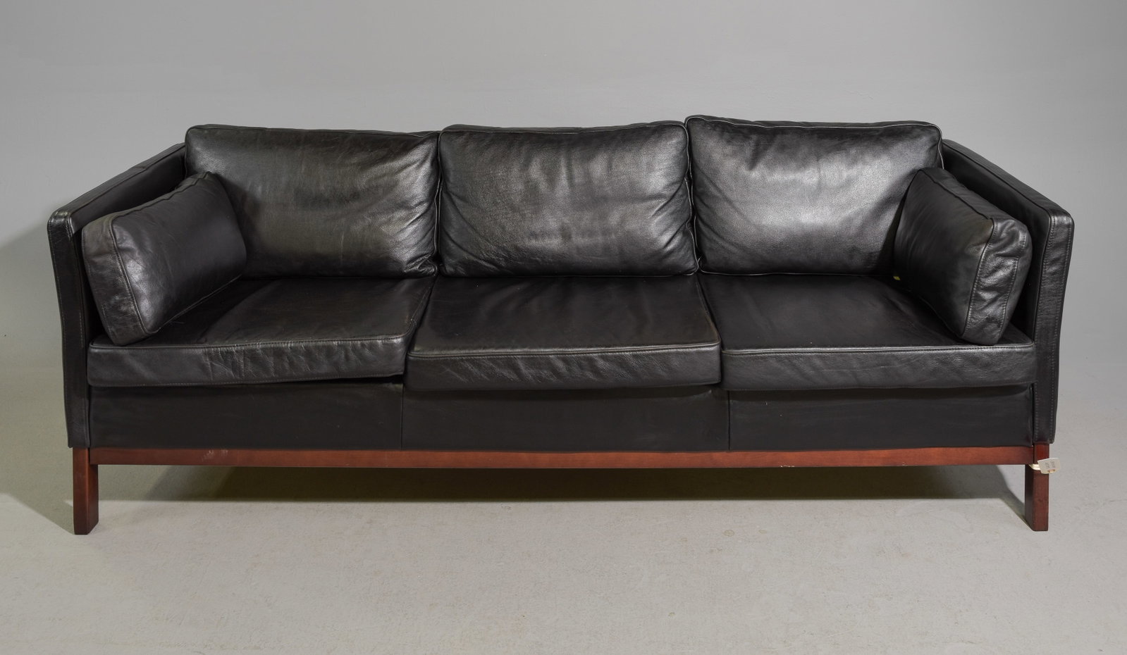 Danish Modern Three Seater Leather Sofa: Danish Mid Century Modern Three Seater Black Leather Sofa - 28 in tall x 82 x 32 with a seat height of 16 inches