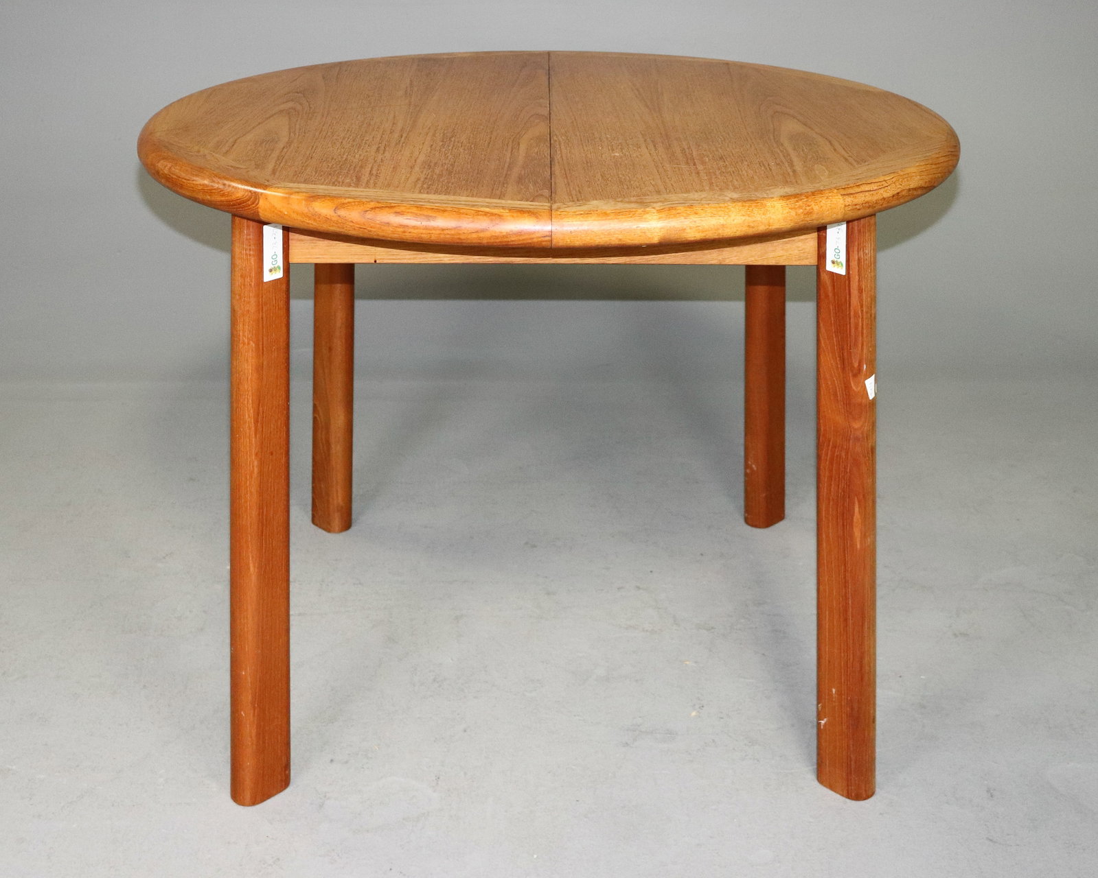 Mid Century Modern Round Dining Table: Danish modern Style Round Dining Table - 28 in tall x 42 in diameter, leaf is 16.25 in, floor to apron is 24.5 and space between legs is 23 in