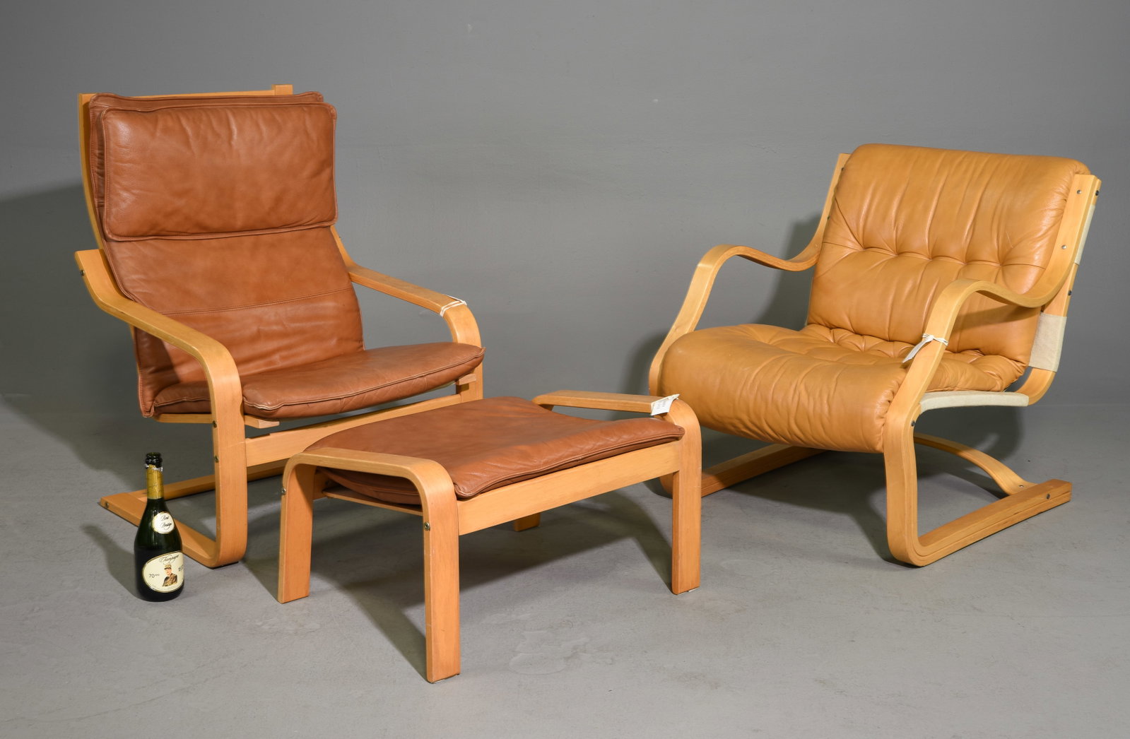 2 Danish Modern Leather Arm Chairs & 1 Stool: 2 Danish Mid Century Modern Leather Arm Chairs & 1 Stool - 30 in tall x 26.5 x 31 with a seat height of 16 inches, 37.5 in tall x 27 x 31 with a seat height of 16 inches, Stool is 15 in tall x 27 x 21