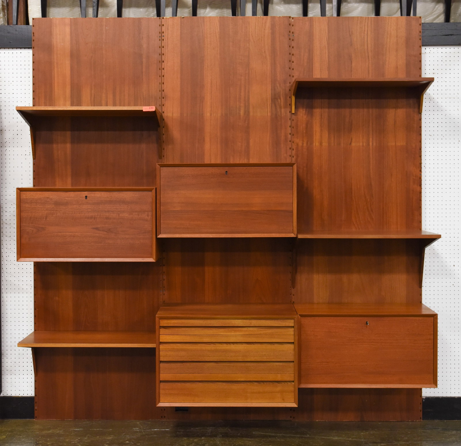 Danish Modern "System Cado" 3 Bay Wall Unit: Danish Mid Century Modern 4 Bay Wall Unit "System Cado" by Poul Cadovius Consists of 3 wall boards with built in slots for components, 4 shelves, 1 chest box,1 drop front wine holder box, 1 drop front