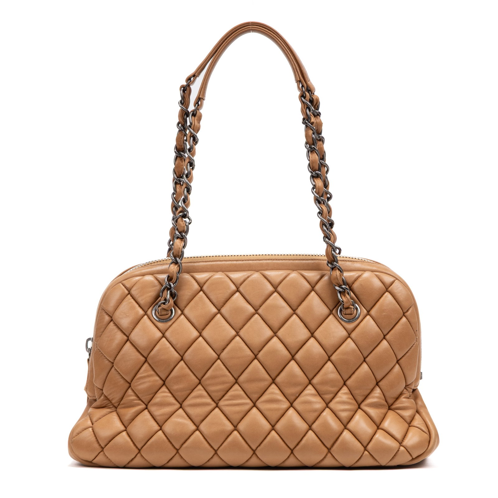 Chanel CC Dome Bag in Tan Quilted Lambskin Leather: Genuine Pre-Owned Chanel CC Dome Bag in Tan Quilted Lambskin Leather made in France in A condition. Date Code is 15152741 (2011) Measurements: 34*22*15cm (Length * Height * Width). This lot includes a