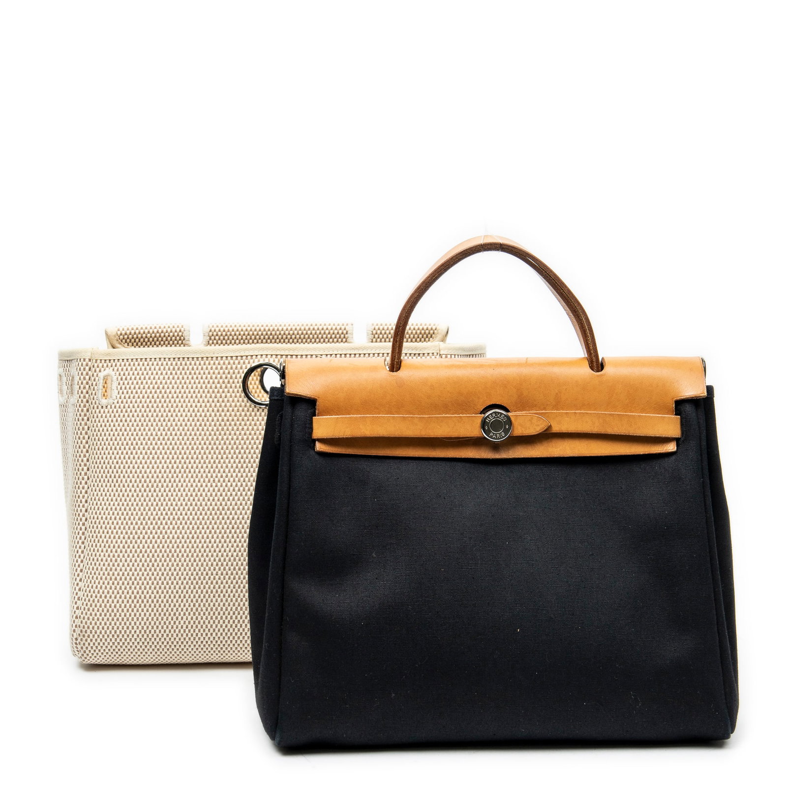 Hermes Herbag 2 in 1 PM in Toile Officier Canvas: Genuine Pre-Owned Hermes Herbag 2 in 1 PM in Beige/Tan Toile Officier Canvas made in France in AB condition. Date Code is Stamp G in Square (2003) Measurements: 31*25*10cm (Length * Height * Width). T