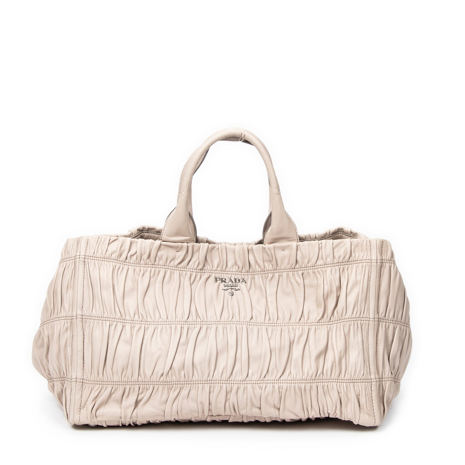 Prada Large Gaufre Tote in Grey Nappa Gaufre Leather: Genuine Pre-Owned Prada Large Gaufre Tote in Grey Nappa Gaufre Leather made in Italy in A condition. Date Code is BN1872 Measurements: 40*23*23cm (Length * Height * Width). This lot includes a certifi