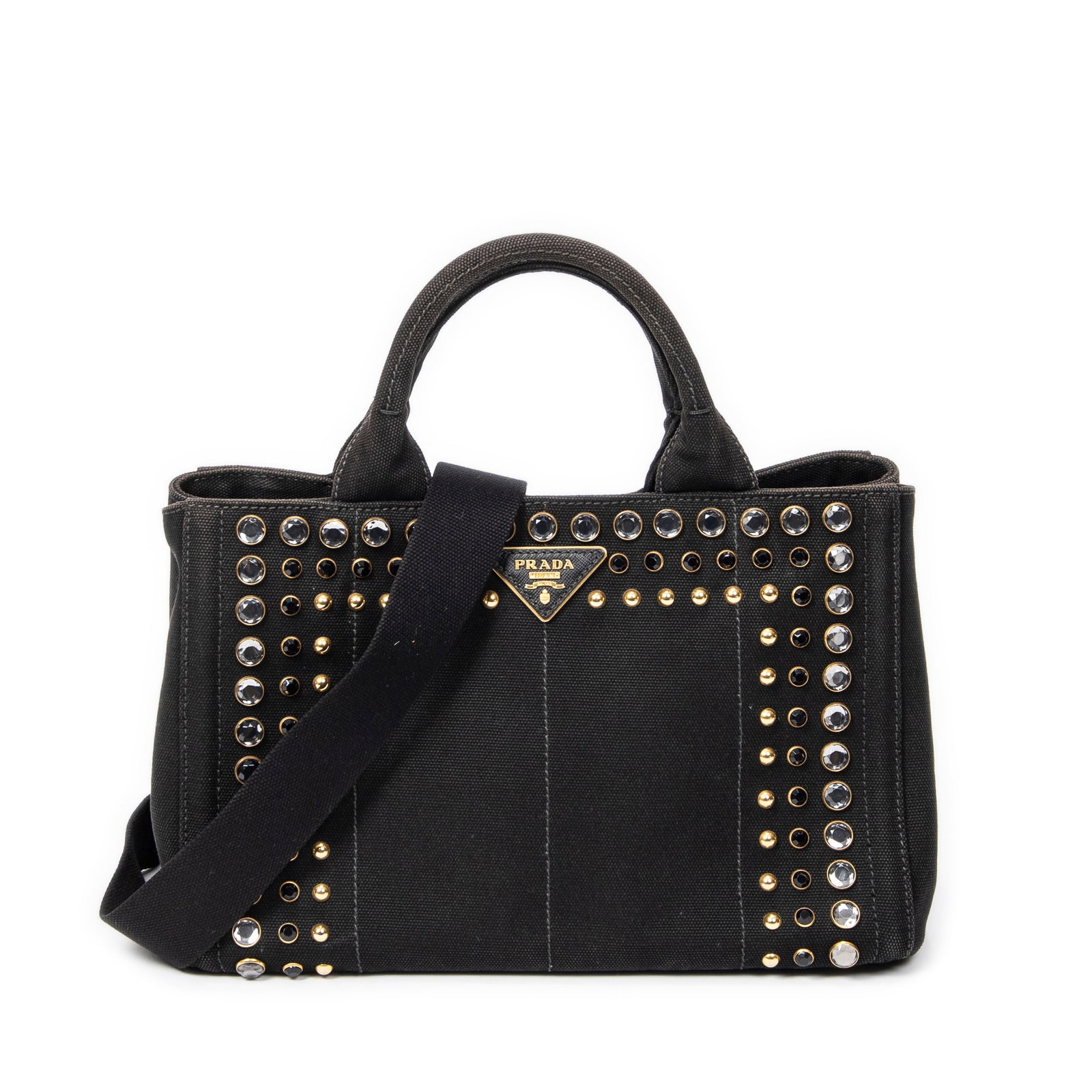Prada Small Rhinestone Canapa Tote in Studded Canvas: Genuine Pre-Owned Prada Small Rhinestone Canapa Tote in Black Studded Canapa Canvas made in Italy in A condition. Date Code is B2439O Measurements: 28*18*15cm (Length * Height * Width). This lot inclu