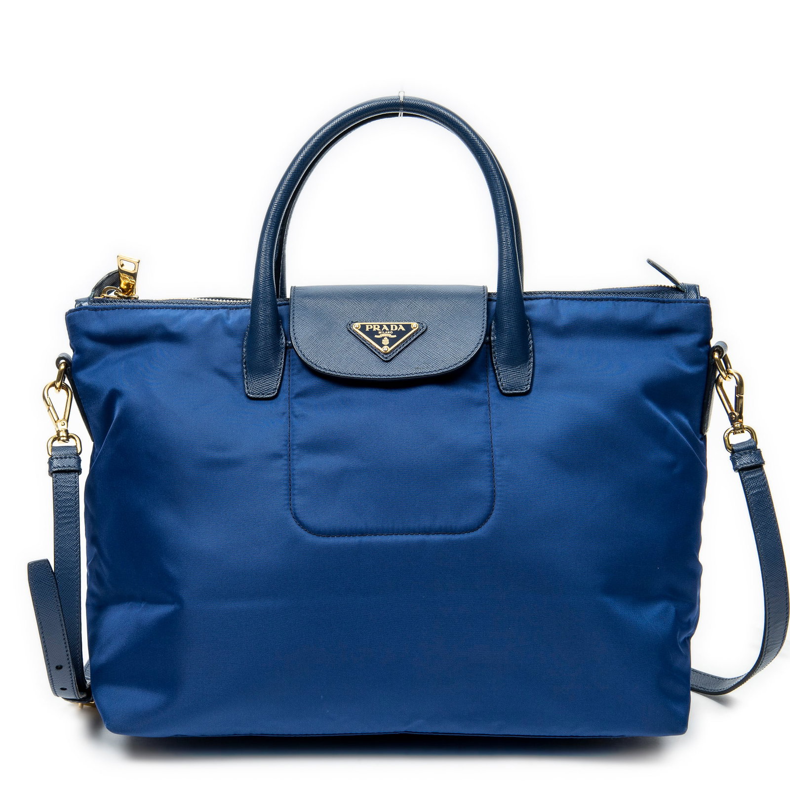 Prada Zip Shopping Tote in Blue Nylon Canvas: Genuine Pre-Owned Prada Zip Shopping Tote in Blue Nylon Canvas made in Italy in A condition. Date Code is 194A Measurements: 33*25*13cm (Length * Height * Width). This lot includes a certificate of au
