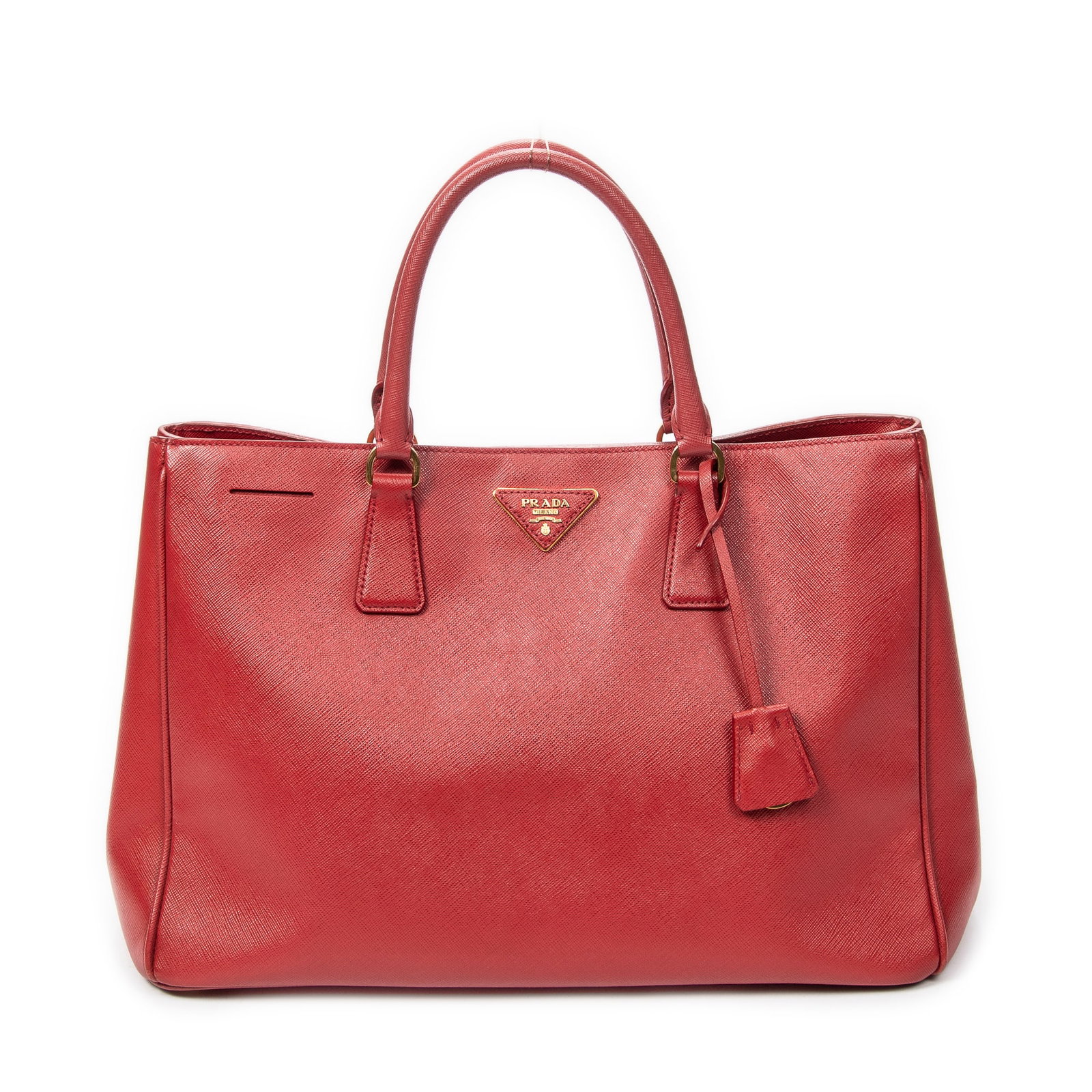 Prada Large Open Tote in Red Saffiano Leather: Genuine Pre-Owned Prada Large Open Tote in Red Saffiano Leather made in Italy in A condition. Date Code is 7I/173 Measurements: 38*26*18cm (Length * Height * Width). This lot includes a certificate of