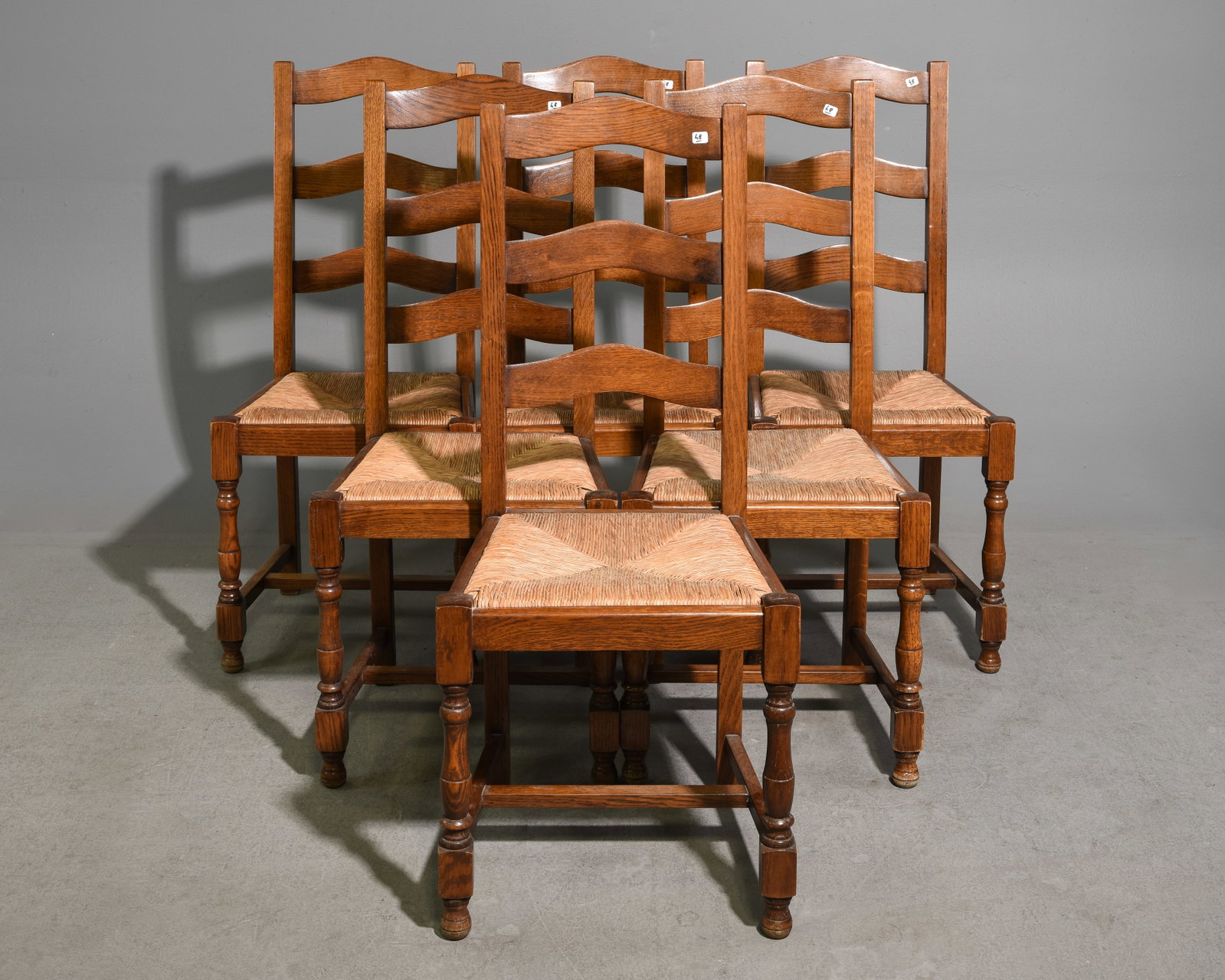 French Set of 6 Oak Rush Seat Ladder Back Chairs: French Set of 6 Oak Rush Seat Ladder Back Chairs - 40.5 in tall x 17.5 x 16.5 each with a seat height of 17.25 inches
