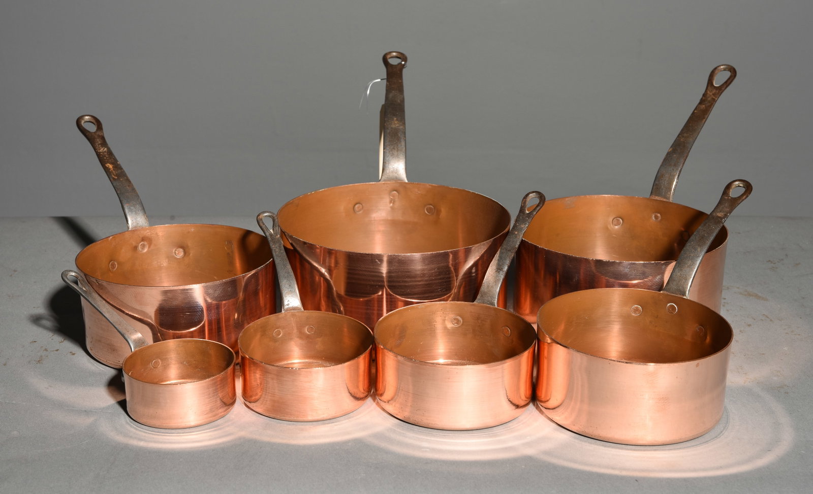 French Set of 7 Graduated Copper Sauce Pans: French Set of 7 Graduated Copper Sauce Pans - Largest is 7.5 in tall x 16 x 8