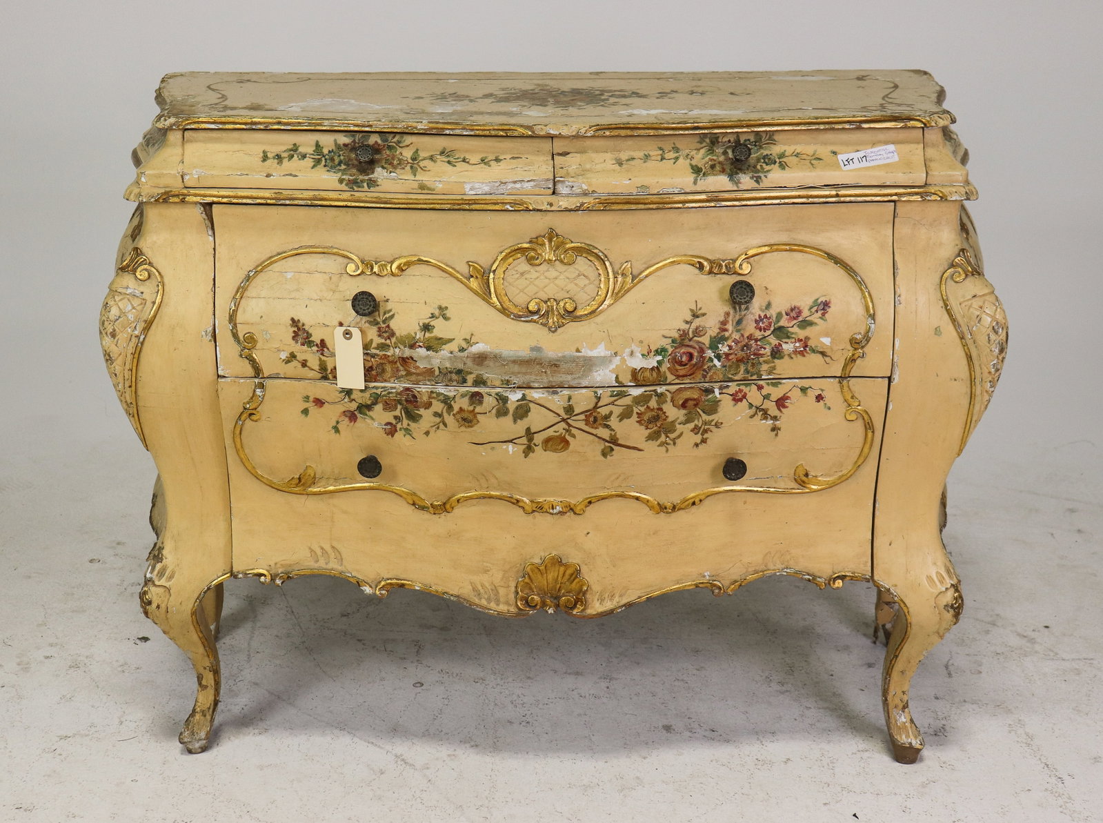 Antique Italian Venetian Painted & Gilt Bombe Commode: Antique Italian Venetian-style bombe commode with a serpentine case, hand-painted floral decoration and gilt Rococo-style scrollwork. Features three drawers, shaped sides and apron, and carved cabriol