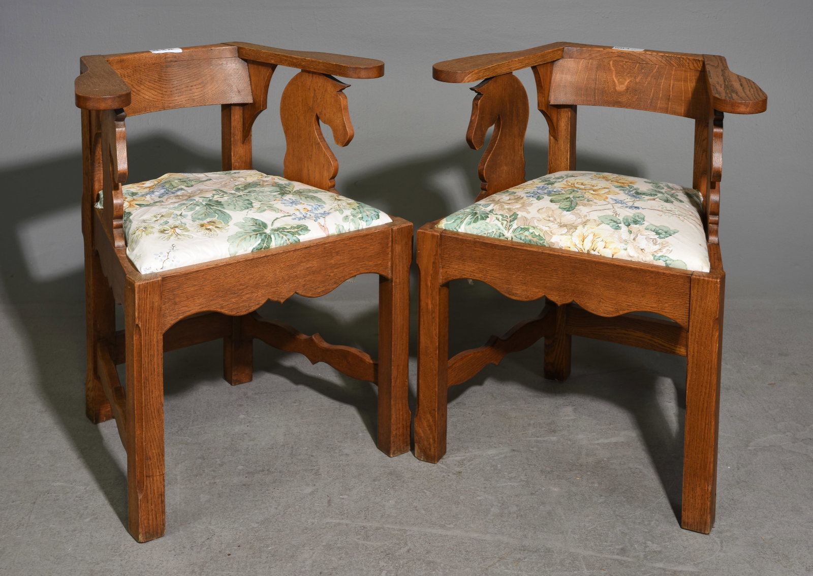 Ranch Style Pair of Oak Horse Head Arm Chairs: Ranch Style Pair of Oak Horse Head Arm Chairs - 30 in tall x 26 x 19 each with a seat height of 19 inches