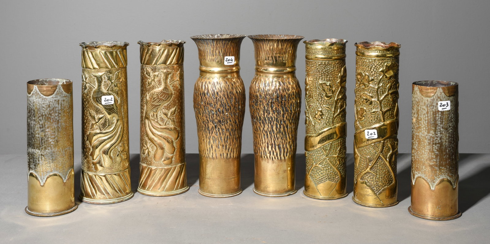Four Pairs of Brass Trench Art Vases: Four Pairs of Brass Trench Art Vases - Tallest is 12 in tall x 4.5 inch diameter