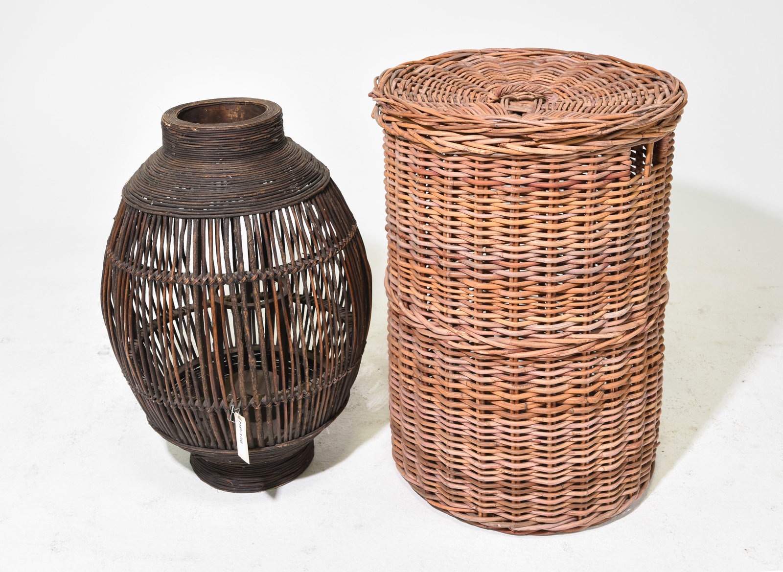2pcs - Woven Wicker Hamper & Wicker Lantern: 2pcs - Woven Wicker Hamper & Wicker Lantern - Hamper is 30 in tall x 22 inch diameter and 28 in tall x 19 inch diameter