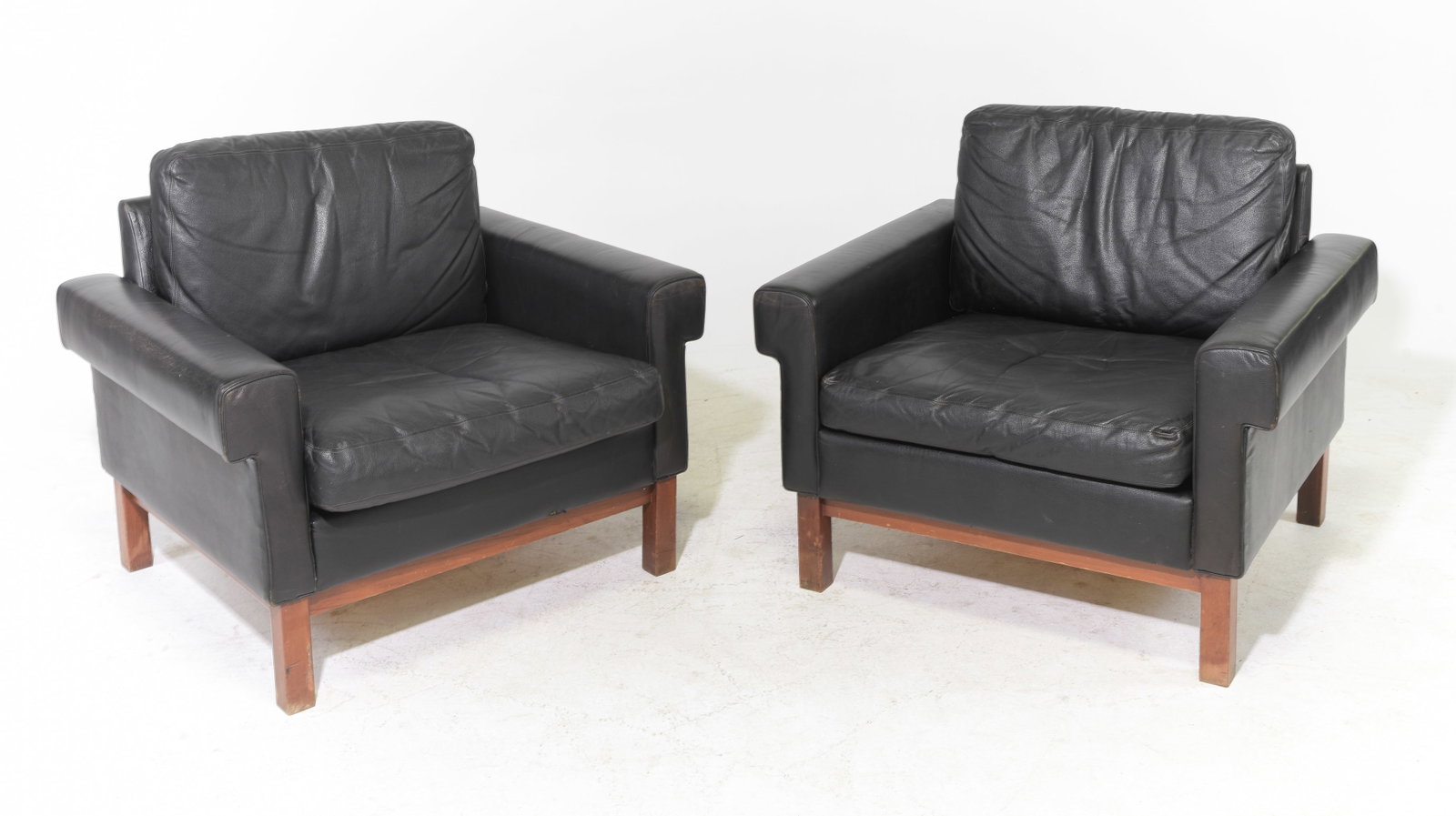 2 Danish Asko Black Leather Lounge Chairs: 2 Mid Century Modern Danish Asko Black Leather Lounge Chairs- 30 in tall x 34.25 x 30.5 each with a seat height of 16 inches