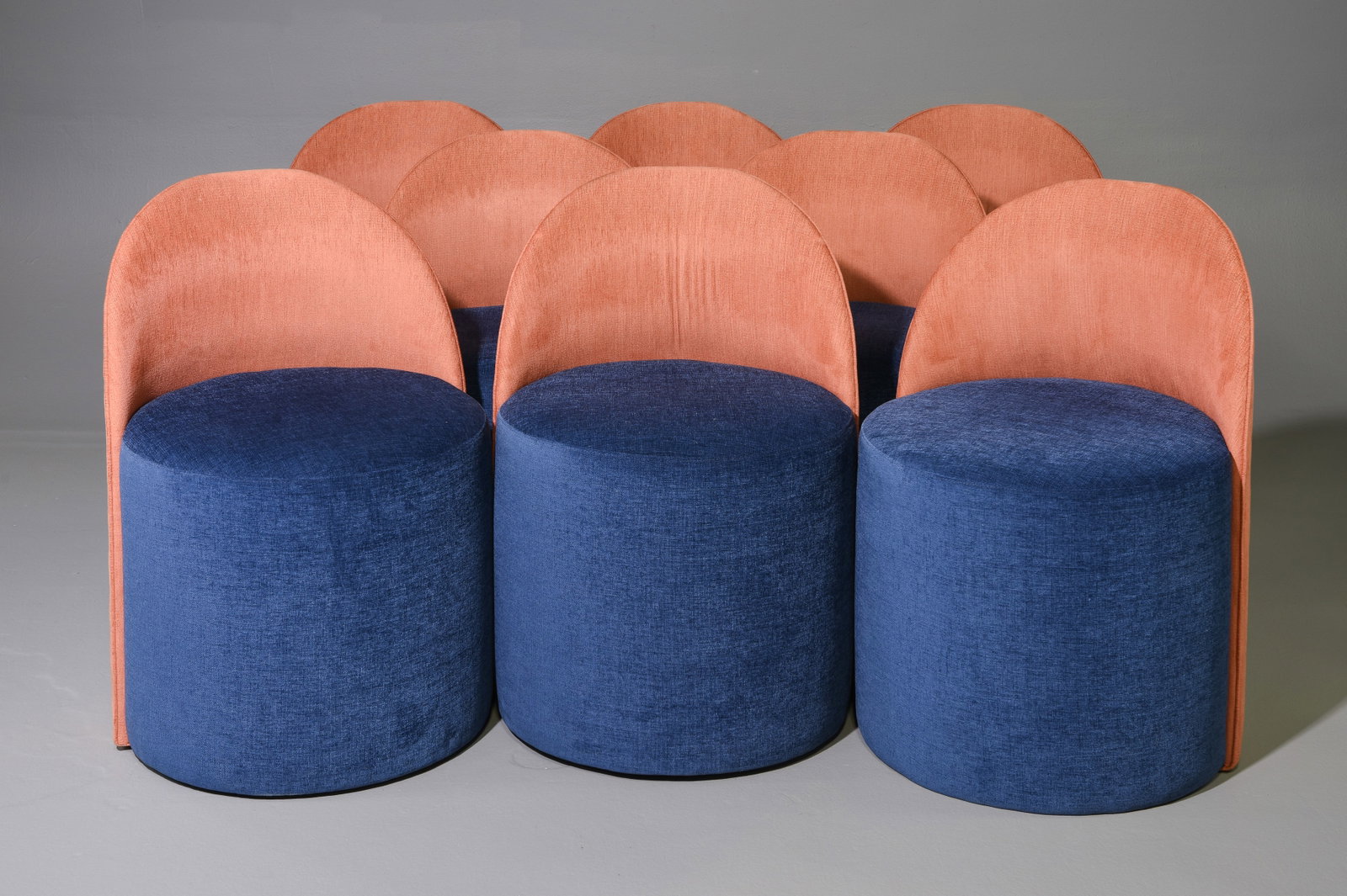 Mitchell Gold & Bob Williams Set of 8 Chairs: Mitchell Gold & Bob Williams Set of 8 curved back chairs featuring a vibrant blue cylindrical base accented by a muted orange arched backrest - 32.25 in tall x 22.75 x 21.75 each with a seat height of
