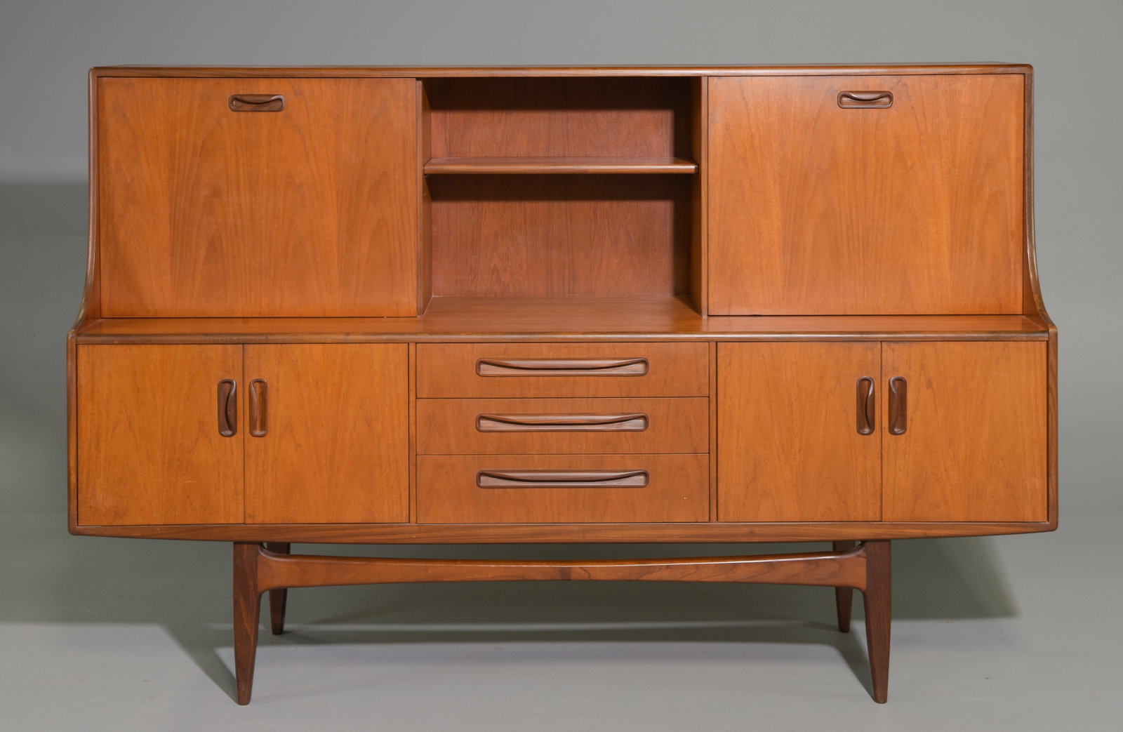 Mid Century Teak Fresco Cocktail Cabinet - Gplan: This Danish Modern Style hutch / high board is British and made by Mid Century Modern Furniture Maker G Plan ( Gplan ) & is part of their "Fresco" Range. It has a drop down section and open stretcher