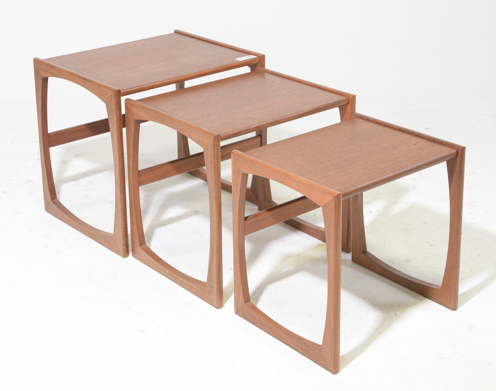 Mid Century Modern Quadrille Nest of 3 Tables: This Danish Modern Style Nest is British and made by Mid Century Modern Furniture Maker G Plan ( Gplan ) it stacks to make a bookcase as well. - 19 in tall x 21 x 17, 18 in tall x 19 x 16.5 and 16.5