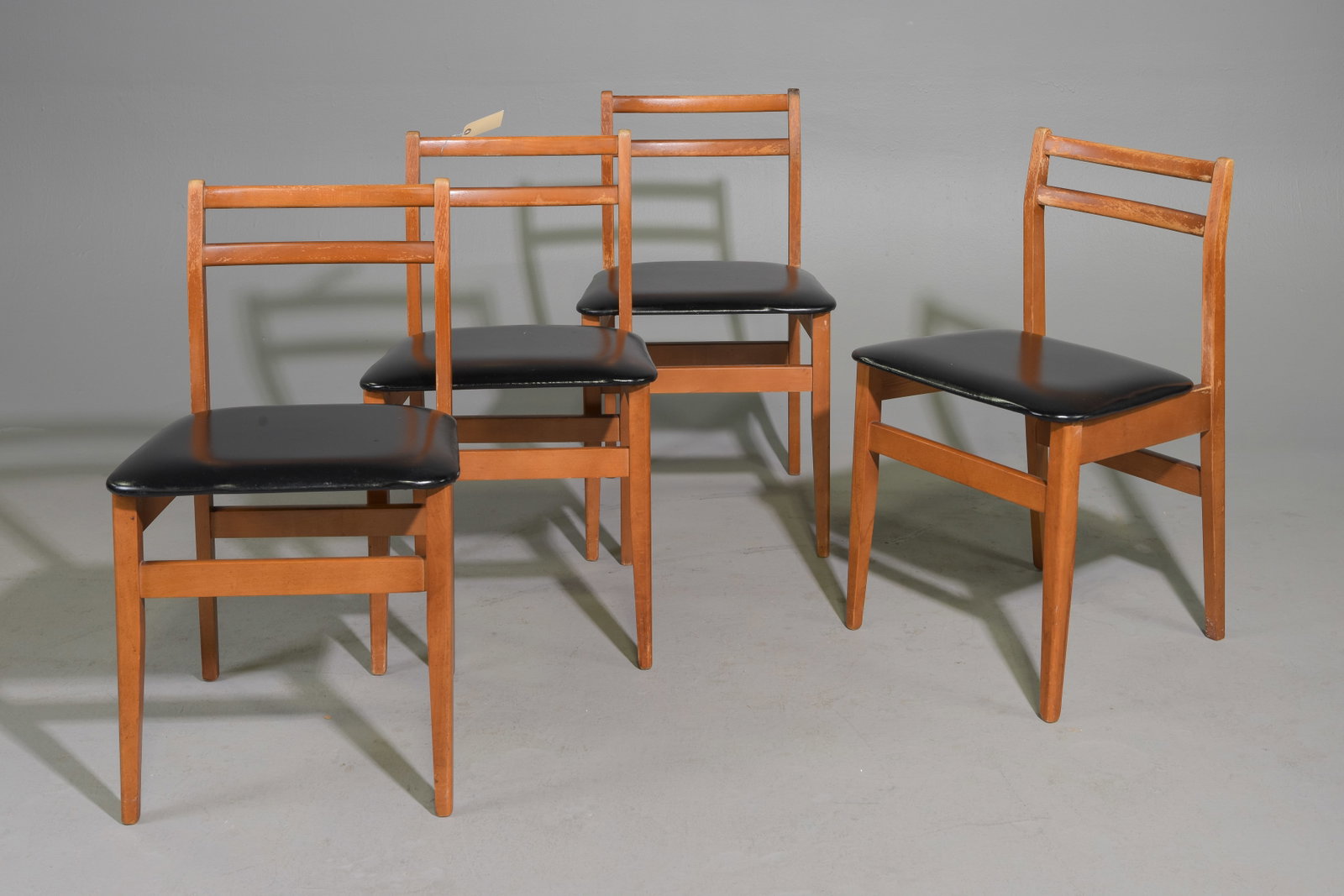 Mid Century Modern Set of 4 Dining Chairs: Danish Modern Style Set of 4 Dining Chairs with Black Vinyl Seats - 30 in tall x 17.5 x 17 each with a seat height of 18 inches