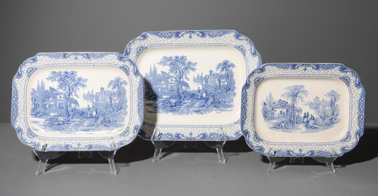 3 English Adams & Sons Blue & White Platters: 3 Graduated Adams & Sons "Landscape" Blue & White Platters featuring a lovely pastoral European river scene - 1 in tall x 14.25 x 11, 1 in tall x 12.25 x 9.25 and 1 in tall x 11.25 x 8.75