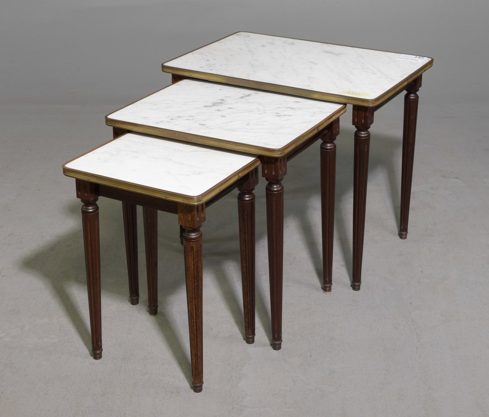 Louis XVI Style White Marble Top Nest of Three Tables: French Louis XVI Style White Marble Top Mahogany Nest of Three Tables supported by tapered legs - 21 in tall x 22 x 15.5, 19.5 in tall x 17 x 13 and 18 in tall x 12.5 x 11