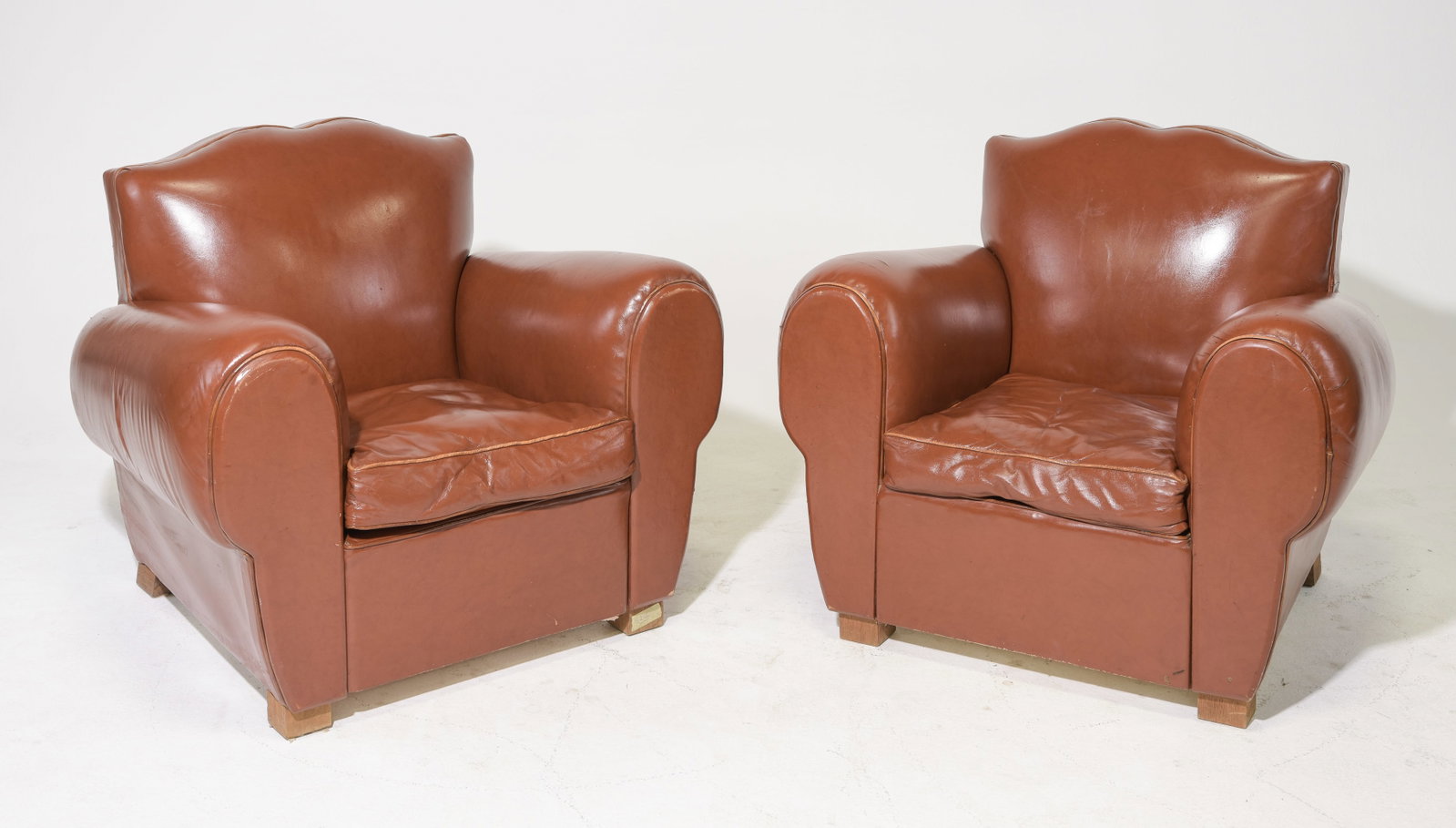 French Pair of Upholstered Mustache Club Chairs: French Pair of Upholstered Mustache Club Chairs - 30 in tall x 35 x 30 each with a seat height of 15 inches