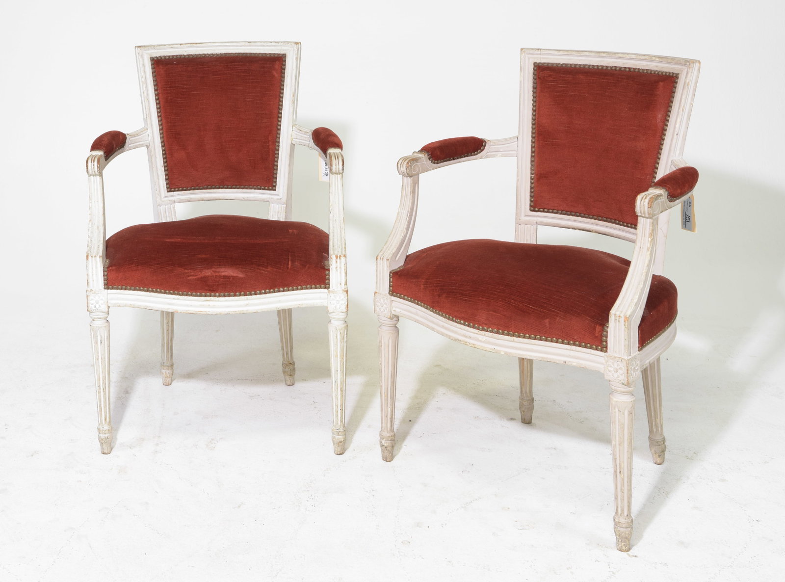 Louis XVI Style Pair of Painted Arm Chairs: French Louis XVI Style Pair of Painted Beech Wood Arm Chairs supported by fluted tapered legs - 34.5 in tall x 23 x 22.5 each with a seat height of 19 inches