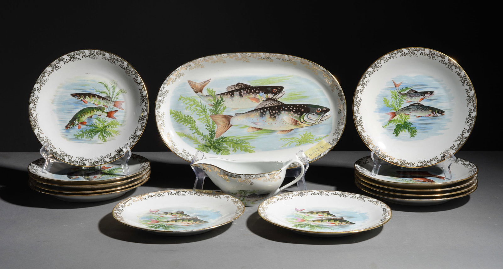 14pc French Fish Plate Set - Platter, Plates, Sauce Boat: 14pc French Fish Plate Set - Platter, 12 Plates, Sauce Boat - Platter is 1 in tall x 15 x 9.5, Plates are 1 in tall x 9.25 inch diameter and the sauce boat is 3 in tall x 8.5 x 4